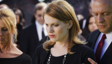 upset woman at funeral